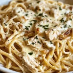 Creamy Crockpot Garlic Parmesan Chicken Pasta